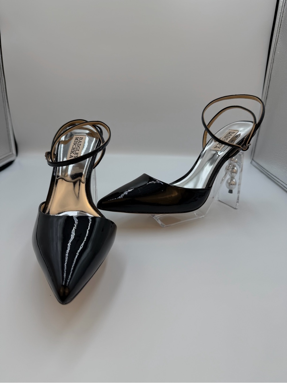 001. Black Patent Pointed Slingback Heels with Clear and silver heel
